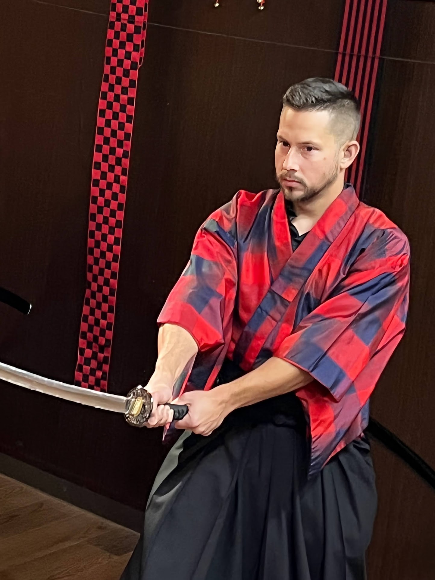 James practicing a two-handed sword stance